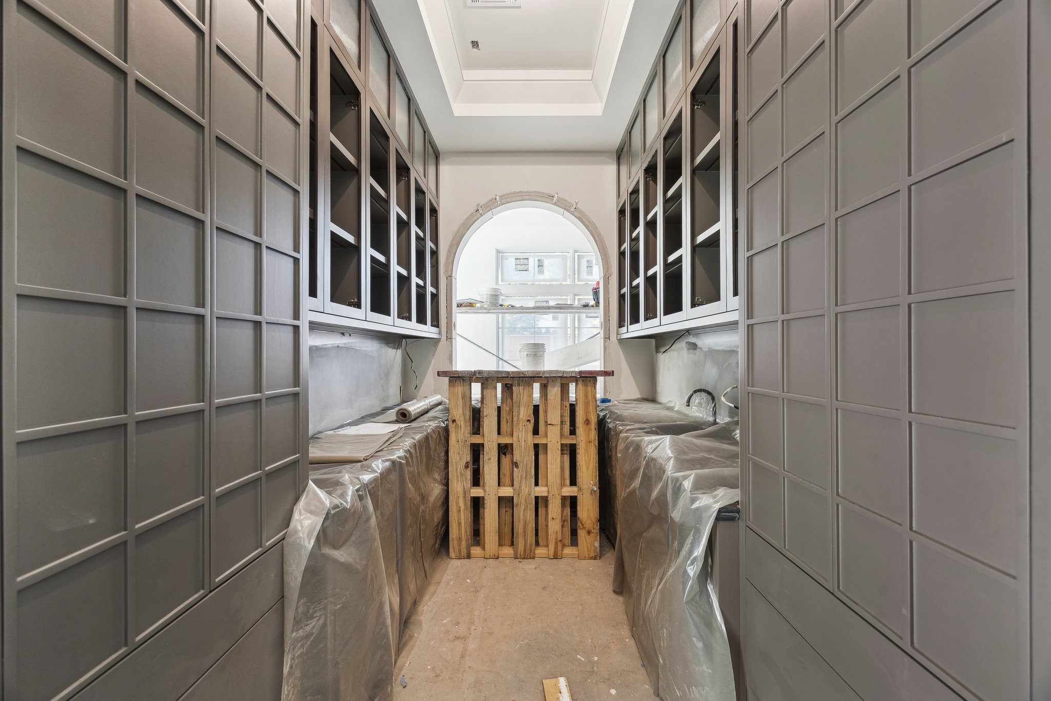 4152 Coleridge Street West University Place, TX 77005 - Photo 6 of 29 There is a back kitchen/bar/butler's area located between the Formal Dining Room and Island Kitchen. There is Sink, Wine Refrigerator, Ice Maker and a Fisher and Paykel Series 9, Integrated Single DishDrawer Dishwasher. There are Two Storage Pantries on each side of the entrance.