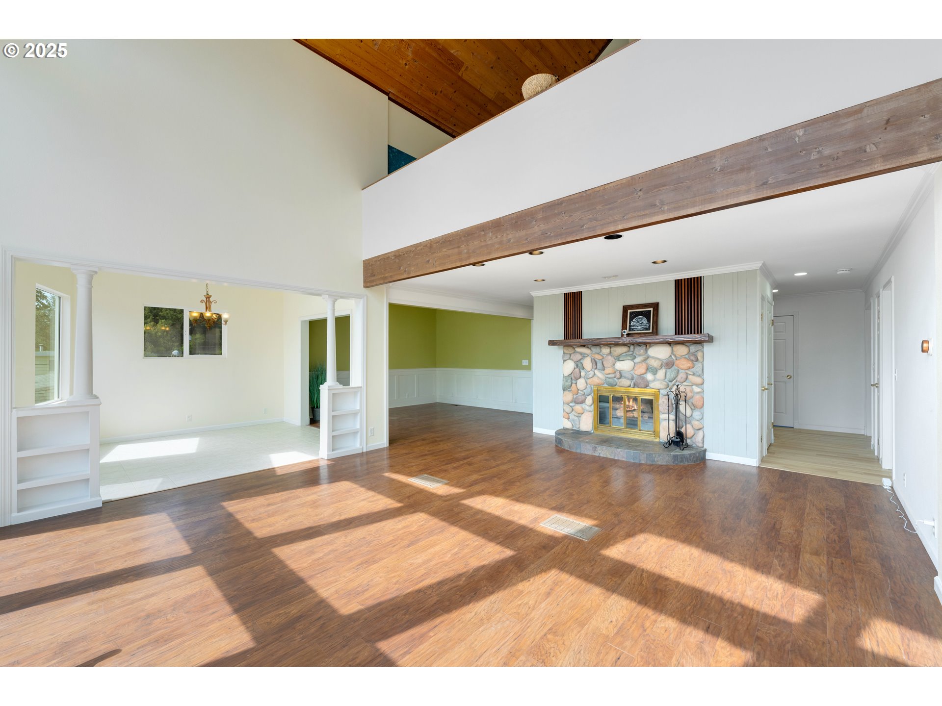 66599 Quail Road North Bend, OR 97459 - Photo 16 of 45 a view of a livingroom with furniture and wooden floor