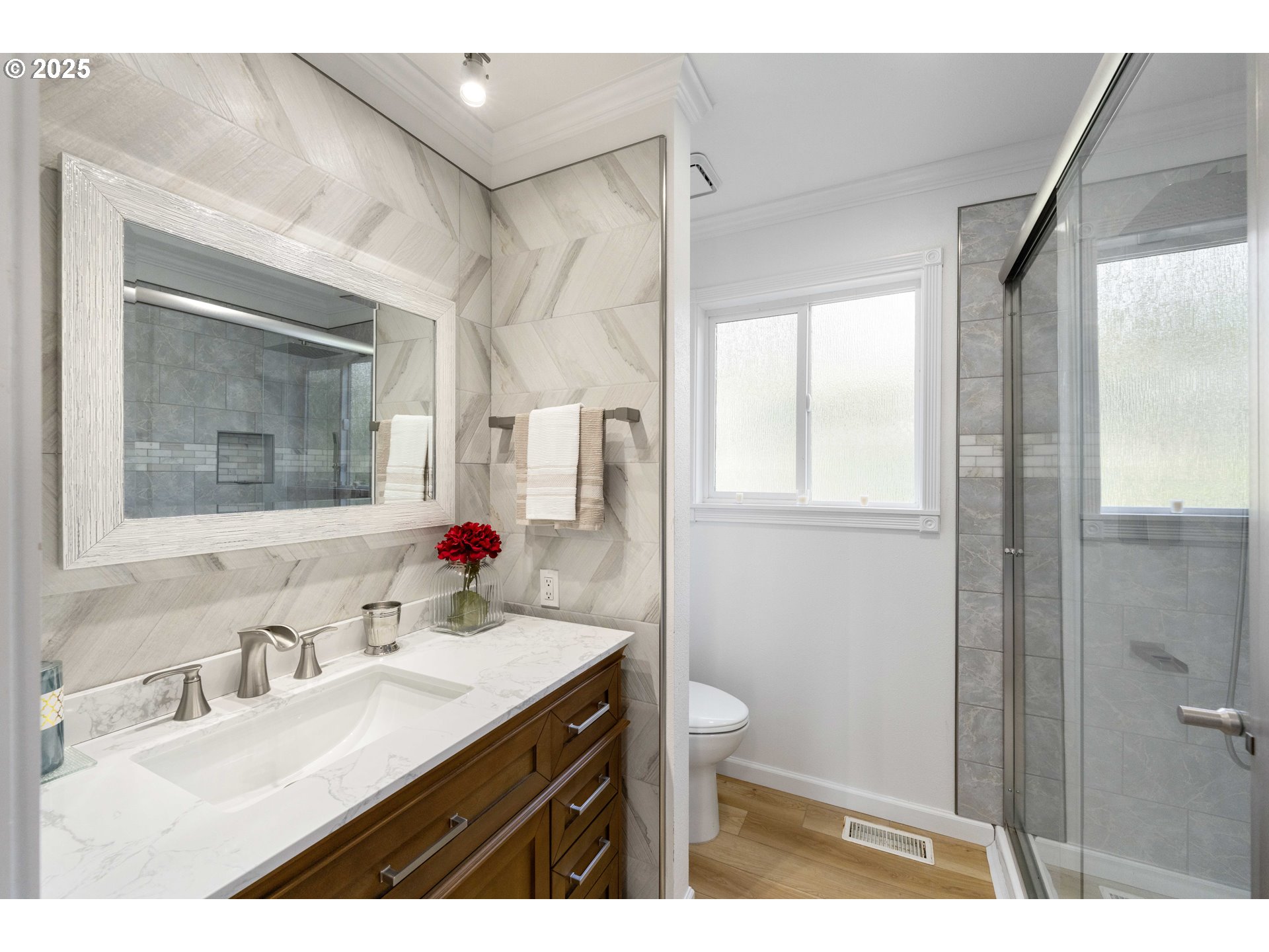 66599 Quail Road North Bend, OR 97459 - Photo 23 of 45 a bathroom with a sink vanity granite and toilet