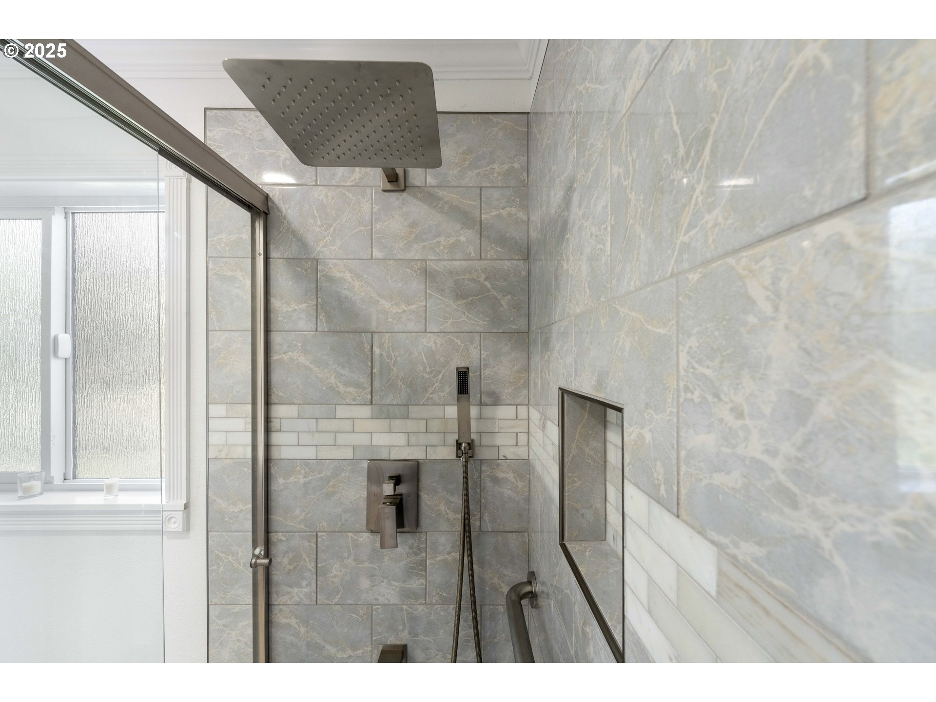 66599 Quail Road North Bend, OR 97459 - Photo 24 of 45 a bathroom with a glass shower door