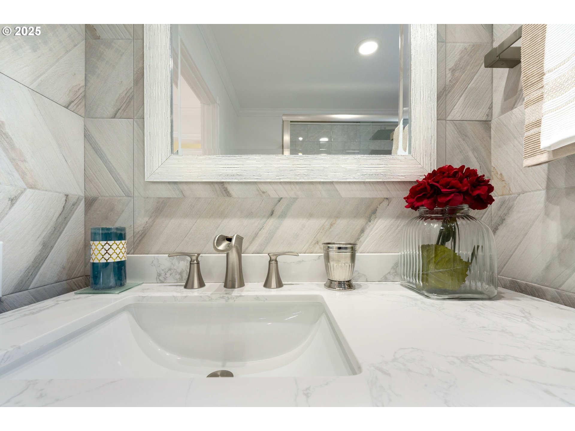 66599 Quail Road North Bend, OR 97459 - Photo 25 of 45 a bathroom with a sink a vanity and a mirror