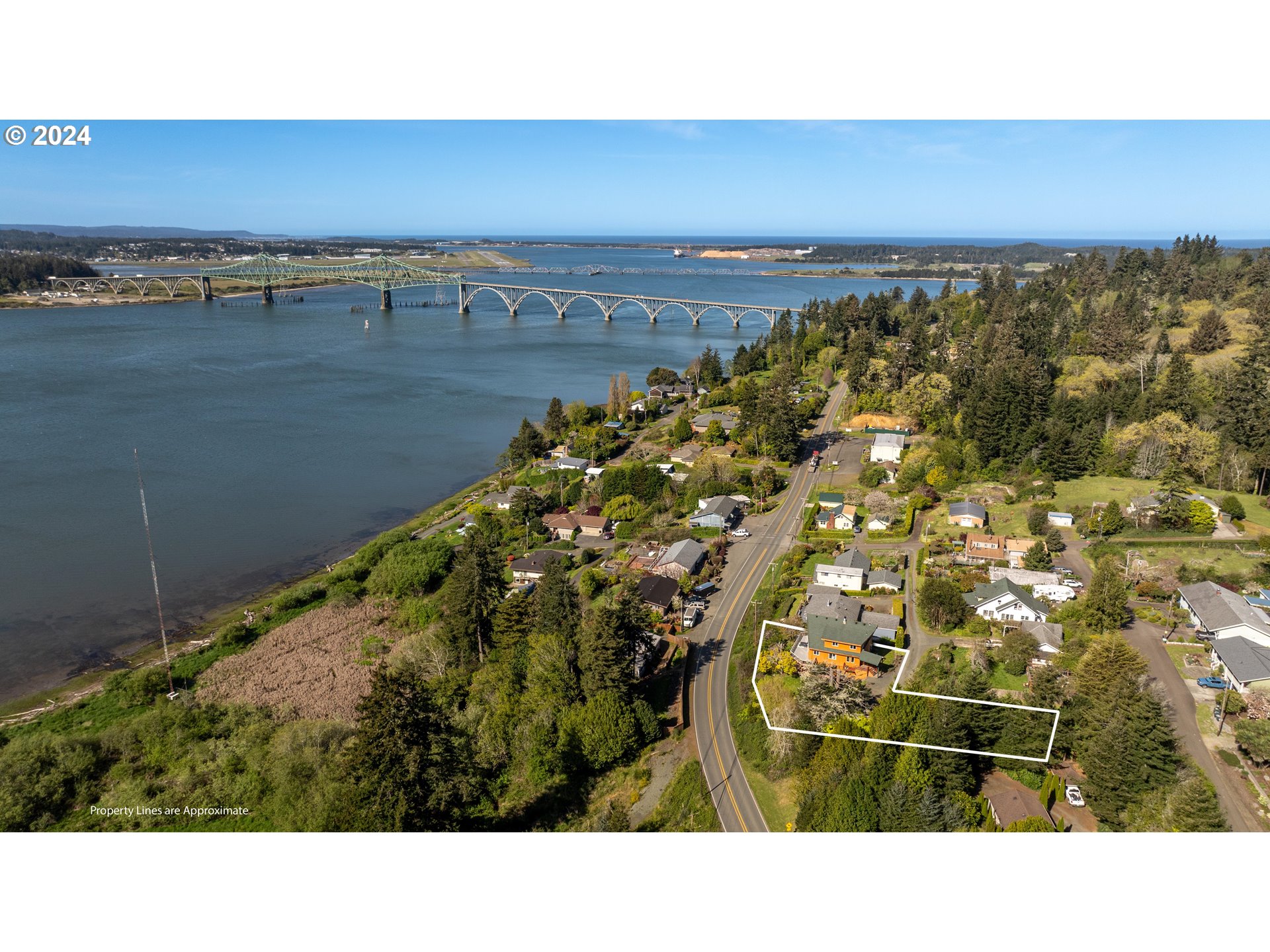 66599 Quail Road North Bend, OR 97459 - Photo 3 of 45 a black and white photo of a building