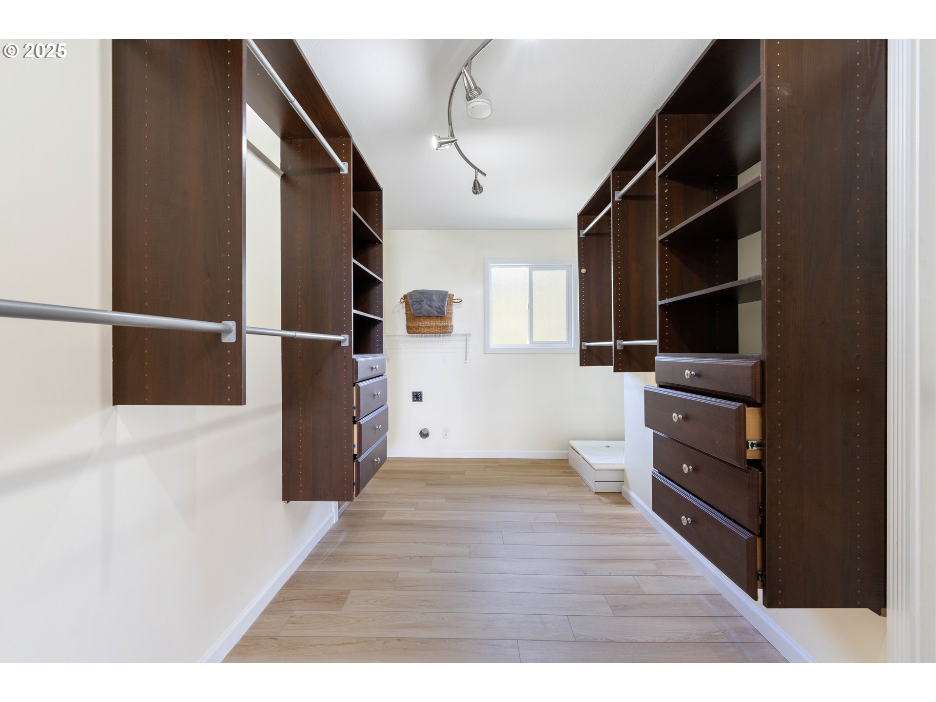 66599 Quail Road North Bend, OR 97459 - Photo 32 of 45 a view of walk in closet with empty racks