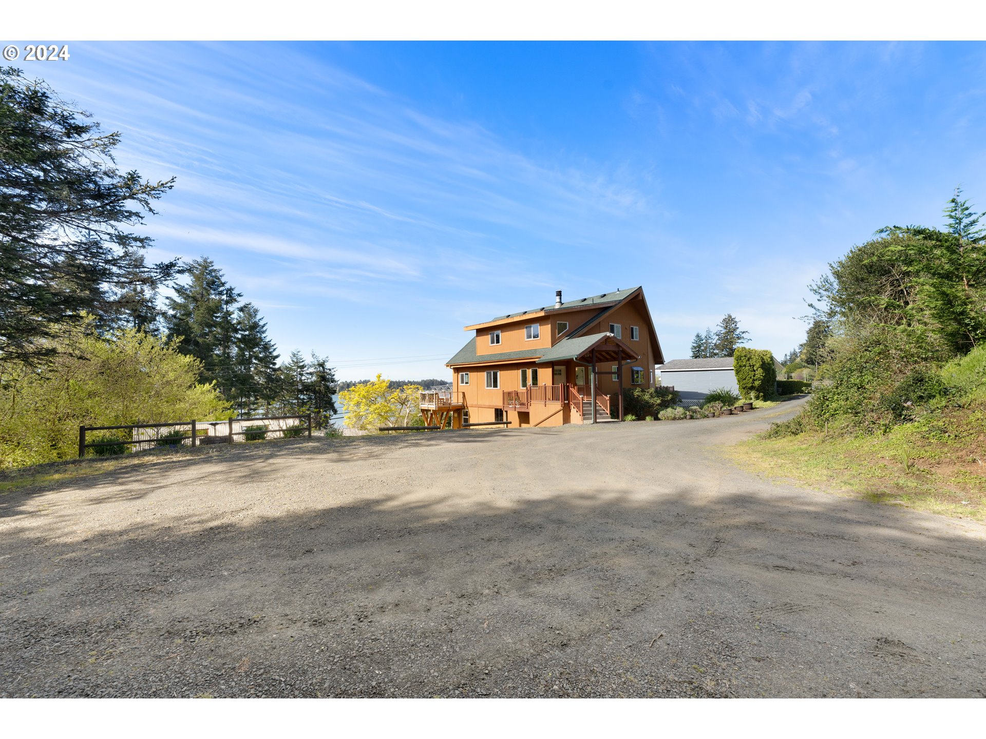 66599 Quail Road North Bend, OR 97459 - Photo 35 of 45 a ocean view with beach and residential space