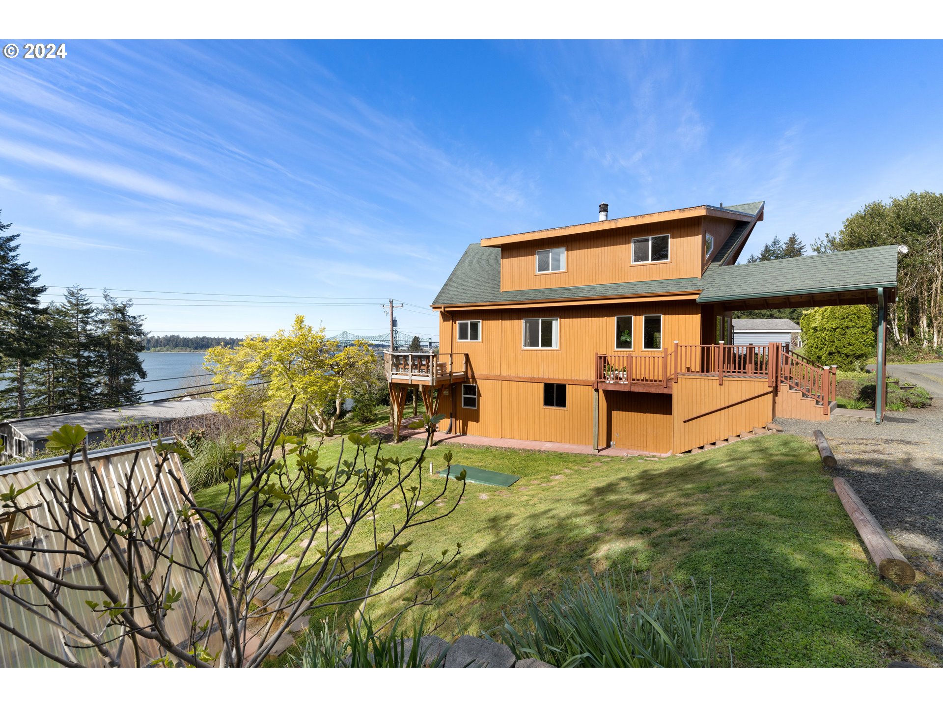 66599 Quail Road North Bend, OR 97459 - Photo 44 of 45 a front view of a house with garden