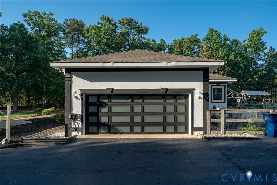 12700 Coalboro Road Chesterfield, VA 23838 - Photo 6 of 50 Modern garage structure featuring a contemporary b
