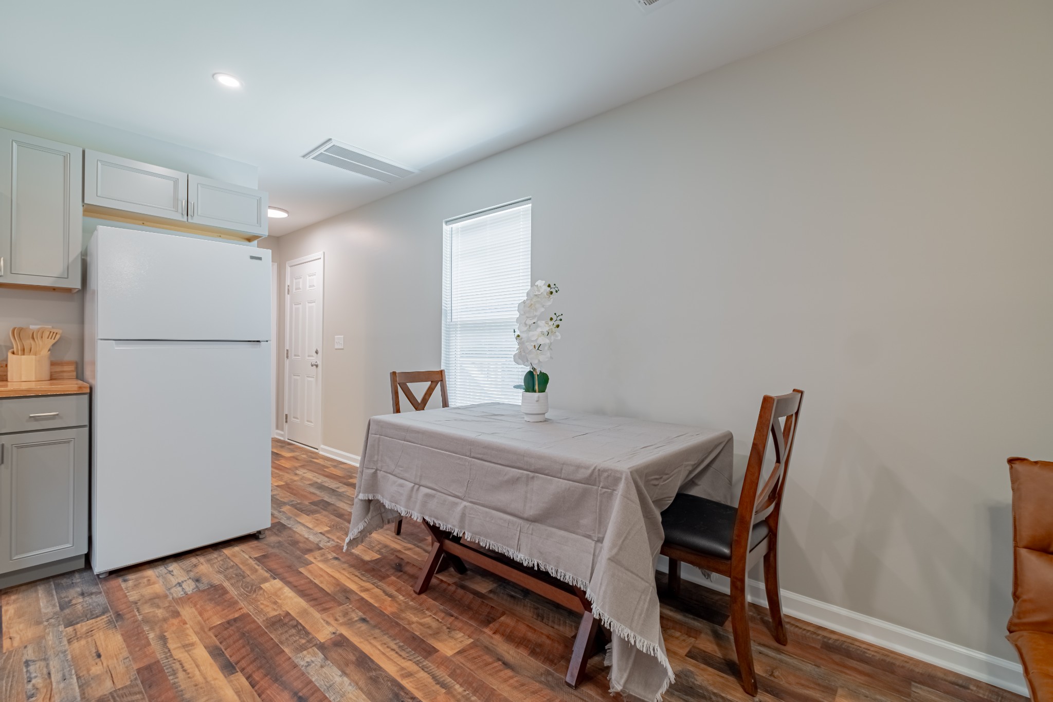 3481 Normandy Road Normandy, TN 37360 - Photo 14 of 27 a dining room with furniture and a refrigerator