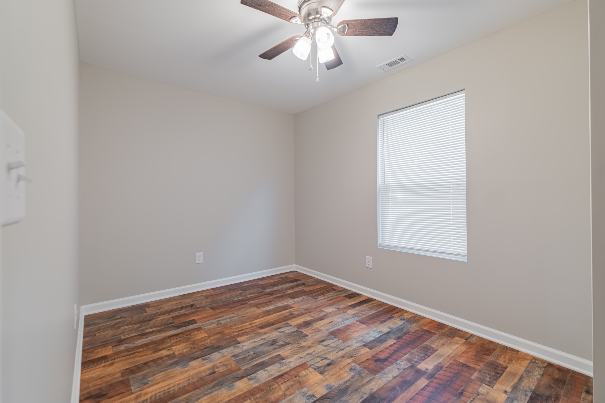 3481 Normandy Road Normandy, TN 37360 - Photo 26 of 27 an empty room with a window and a fan