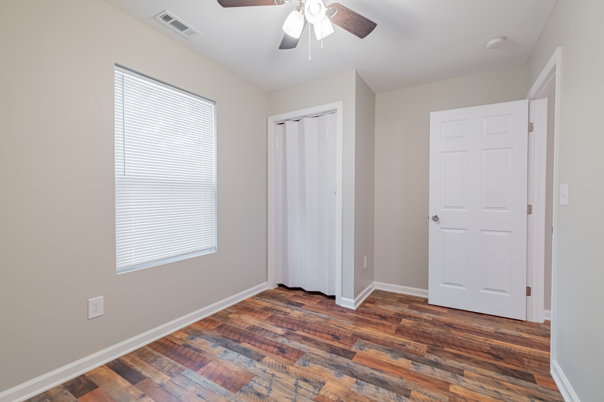 3481 Normandy Road Normandy, TN 37360 - Photo 27 of 27 a view of empty room with wooden floor and fan