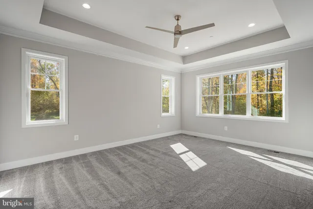 a view of empty room with windows