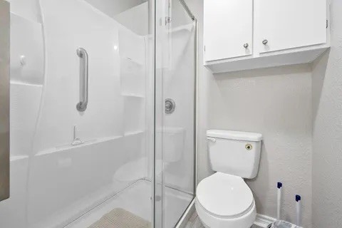 2003 North Fulton Beach Road, Unit 43 Rockport, TX 78382 - Photo 14 of 30 Close up view of large shower with frameless sliding doors.