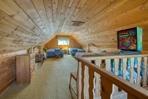 a view of an empty room with stairs