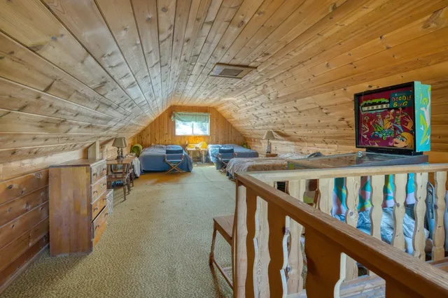 a view of an empty room with stairs