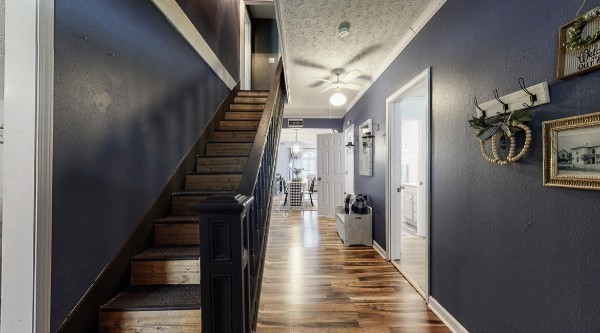 419 East Main Street Red Boiling Springs, TN 37150 - Photo 13 of 44 a view of a hallway with wooden floor and staircase