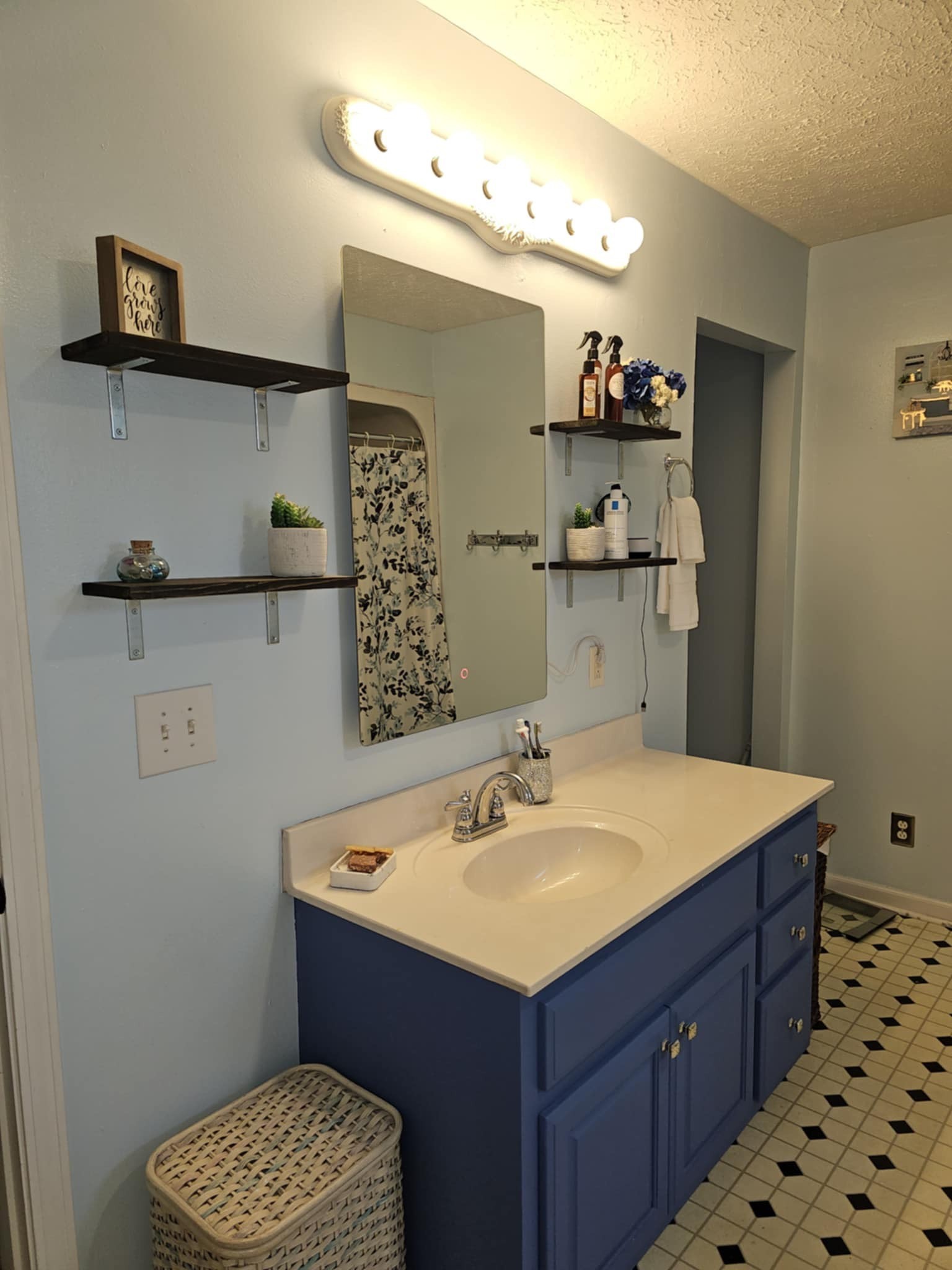 419 East Main Street Red Boiling Springs, TN 37150 - Photo 42 of 44 a bathroom with a sink and a mirror
