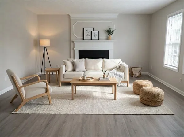 a kitchen with a stove a sink a dining table and chairs