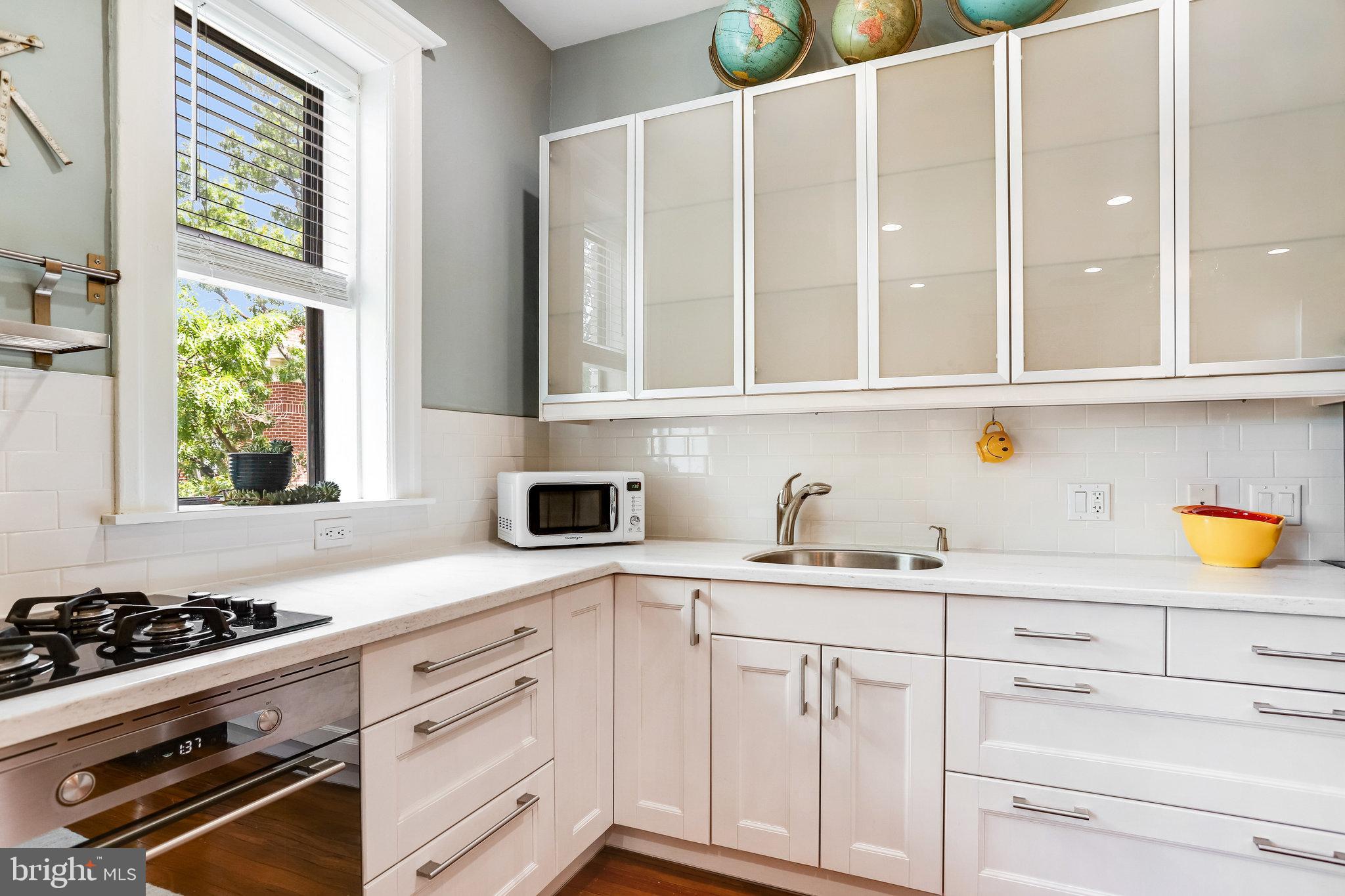 1514 17th Street Northwest, Unit 412 Washington, DC 20036 - Photo 5 of 23 Bright kitchen with window