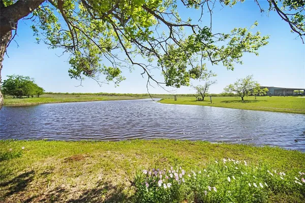 a view of a yard with an outdoor space