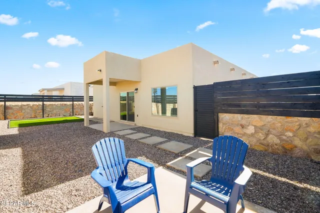 a view of kitchen with furniture and a fireplace