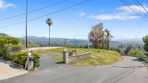 a view of a swimming pool with a garden