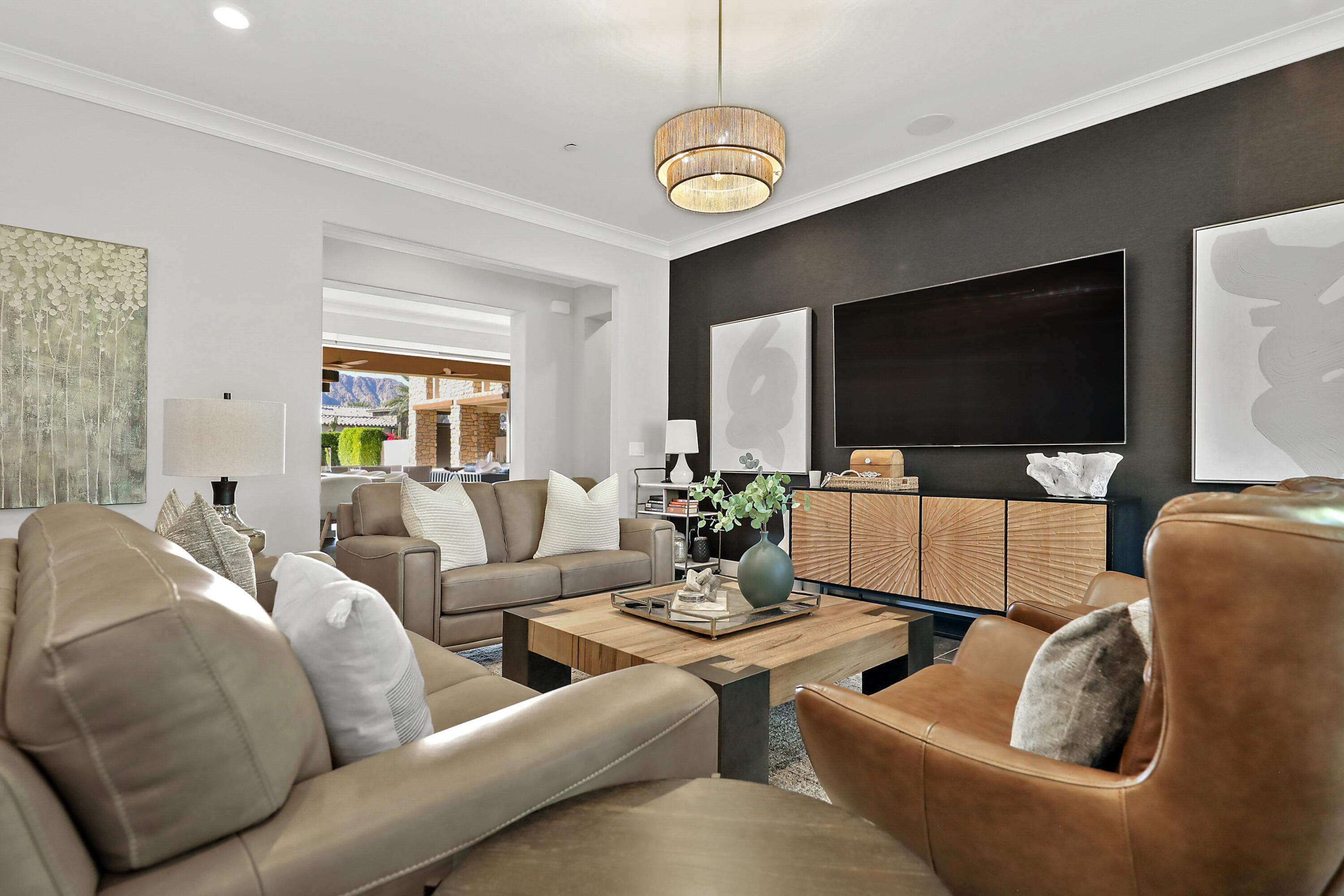 54820 Aristides Court La Quinta, CA 92253 - Photo 15 of 62 a living room with furniture and a flat screen tv