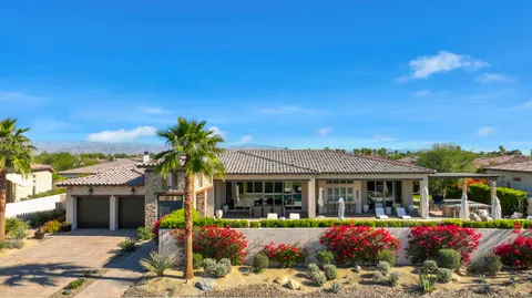 a front view of house with yard outdoor seating and barbeque oven