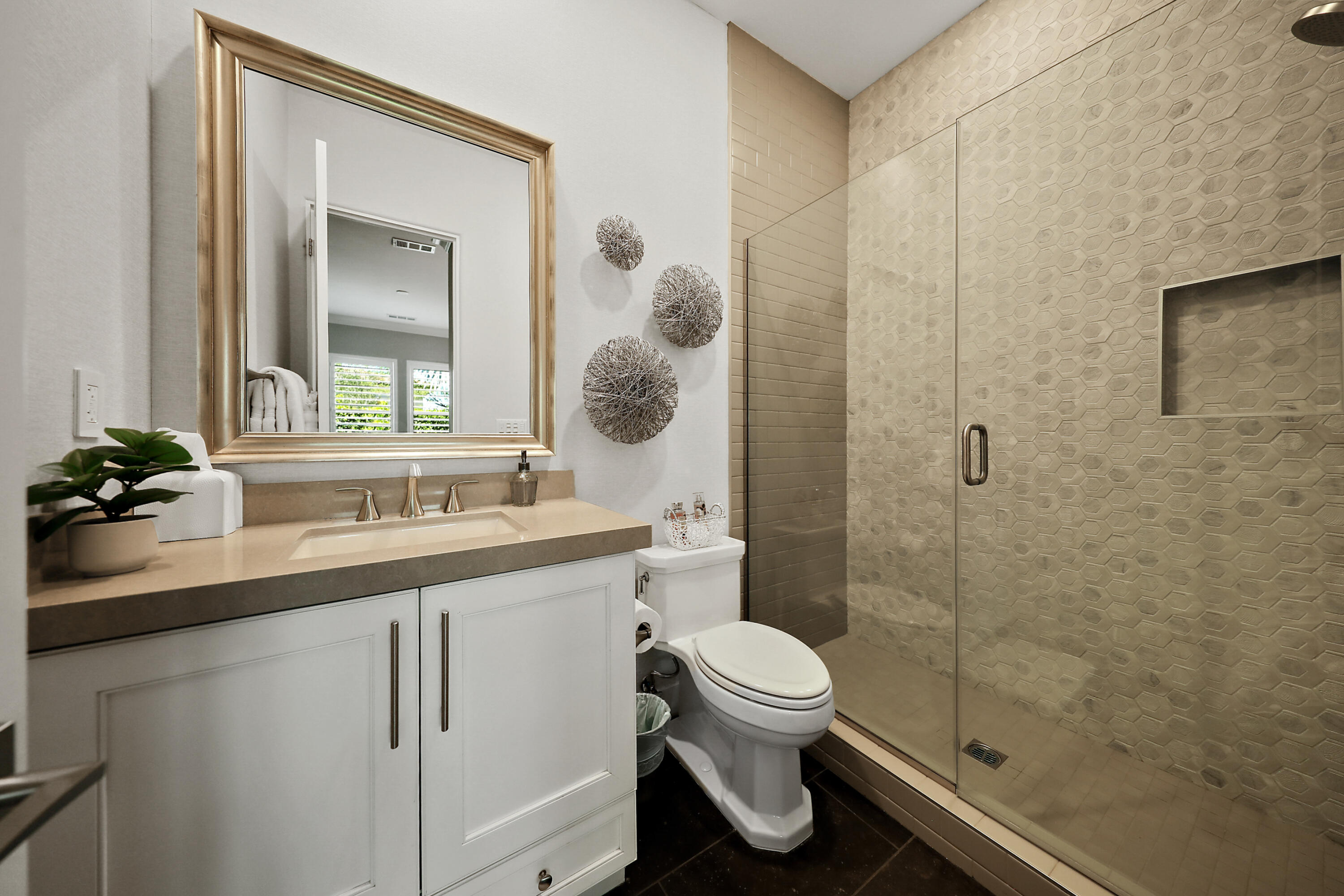 54820 Aristides Court La Quinta, CA 92253 - Photo 24 of 62 a bathroom with a sink a toilet and shower