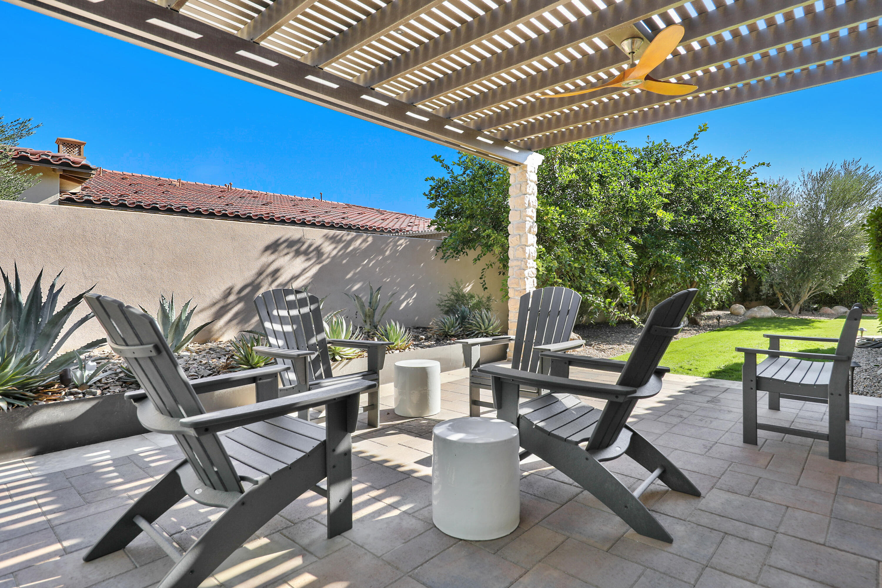 54820 Aristides Court La Quinta, CA 92253 - Photo 38 of 62 a view of a chairs and table in the patio