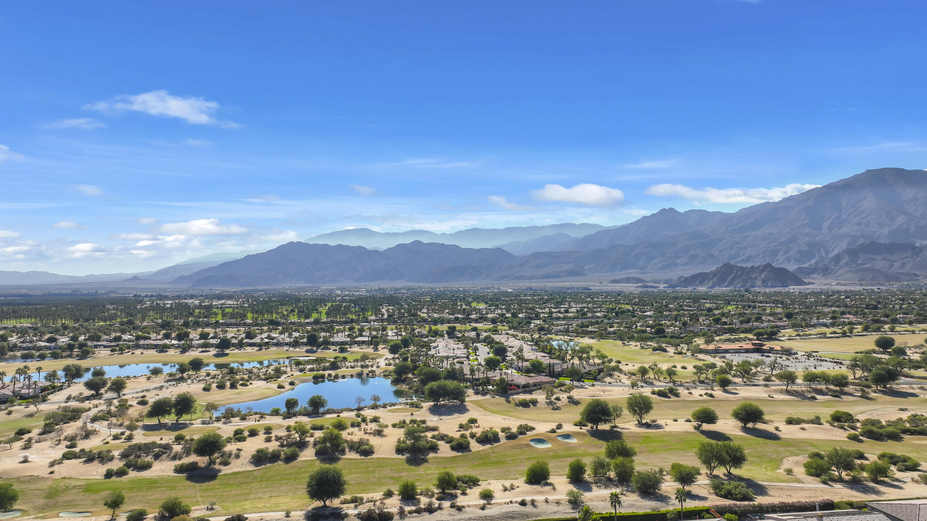 54820 Aristides Court La Quinta, CA 92253 - Photo 46 of 62 a view of a city with mountains in the background