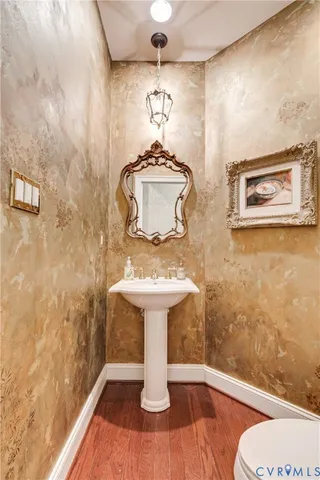 a bathroom with a sink and toilet