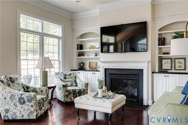 a view of backyard with wooden fence and trees