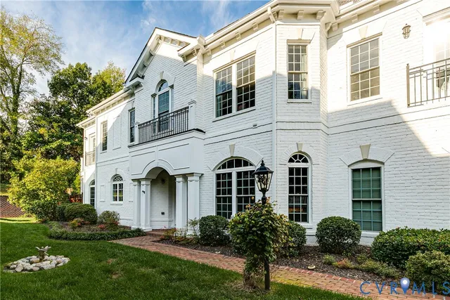 a view of an entryway with wooden floor and stairs