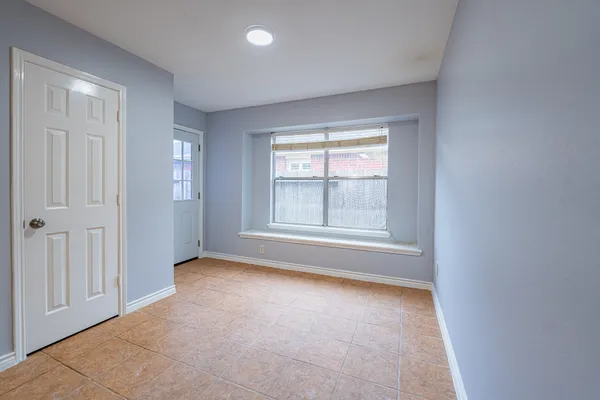 an empty room with windows