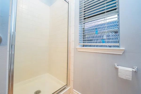 a view of a bathroom that has a window