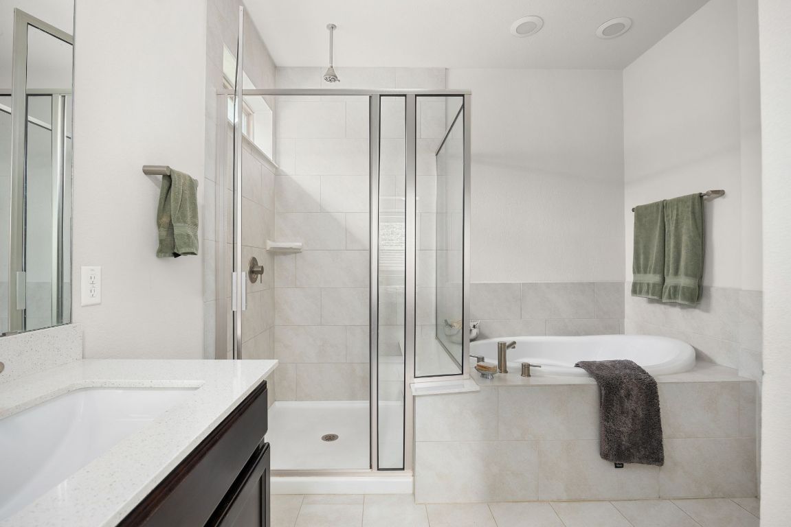 1340 Terrace View Drive Georgetown, TX 78628 - Photo 11 of 25 a bathroom with a bathtub and a sink