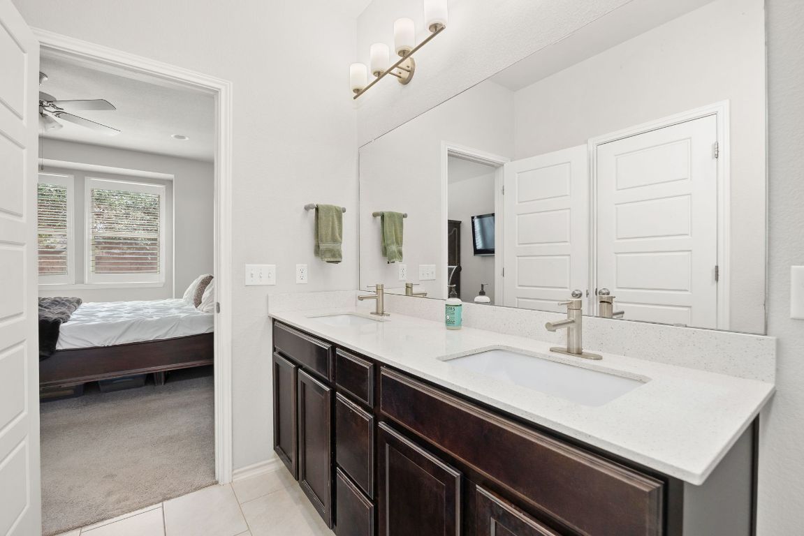 1340 Terrace View Drive Georgetown, TX 78628 - Photo 12 of 25 a en suite bathroom with a sink and a bathtub