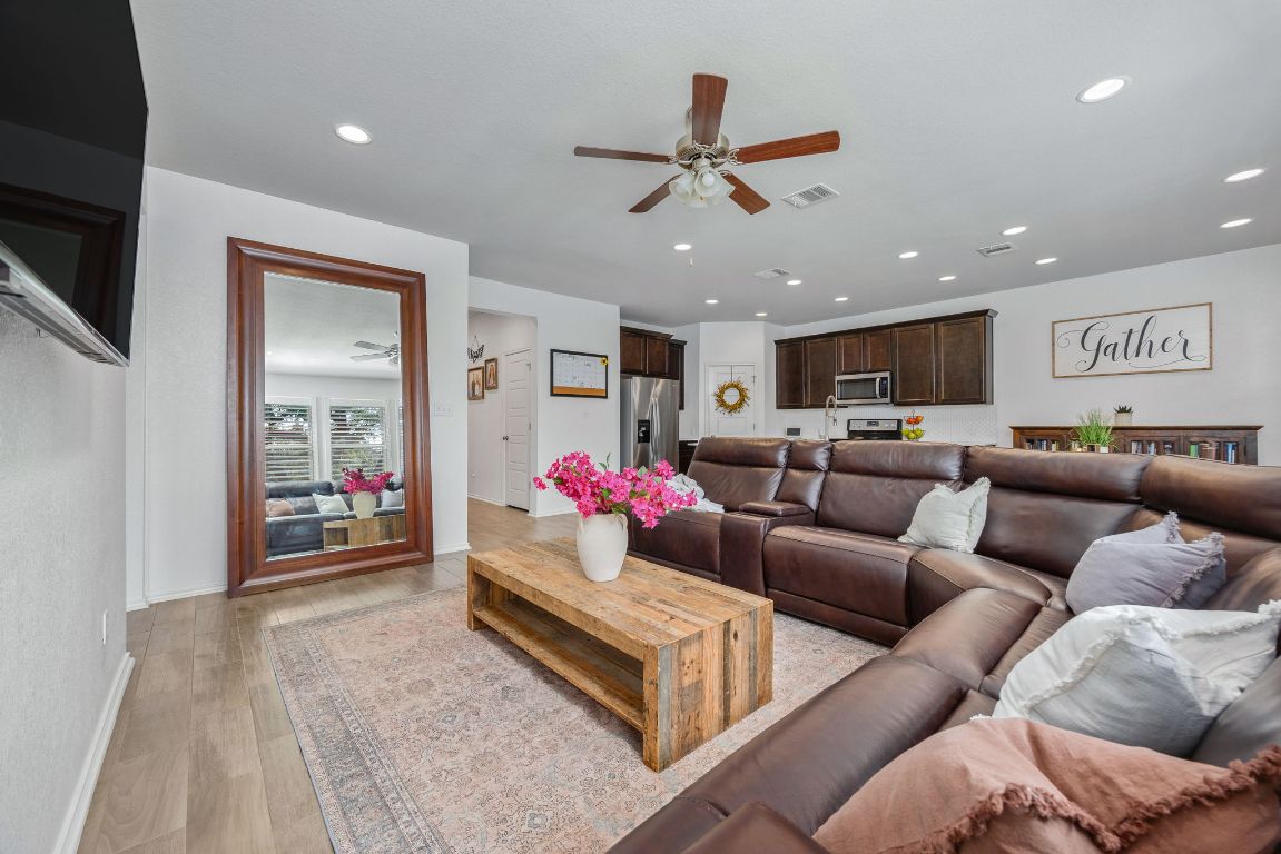 1340 Terrace View Drive Georgetown, TX 78628 - Photo 7 of 25 a living room with furniture and a flat screen tv