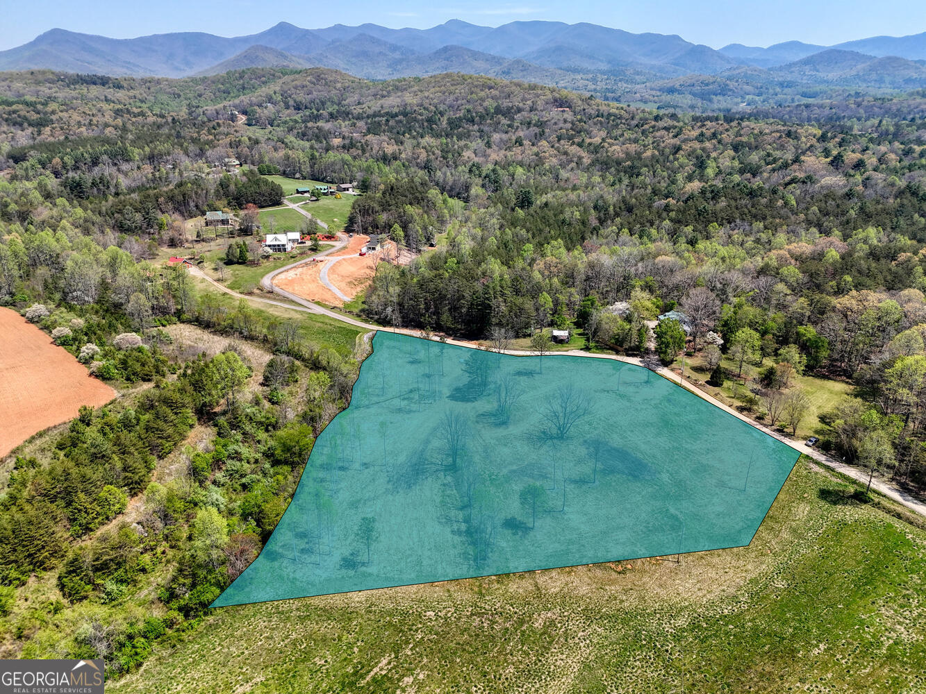 Ii Ii Shuler Road Blairsville, GA 30512 - Photo 15 of 19 a view of a lush green hillside and a houses