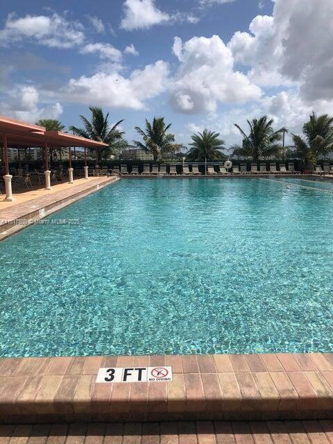 155 Suffolk F, Unit D Boca Raton, FL 33434 - Photo 41 of 41 a view of swimming pool from a balcony