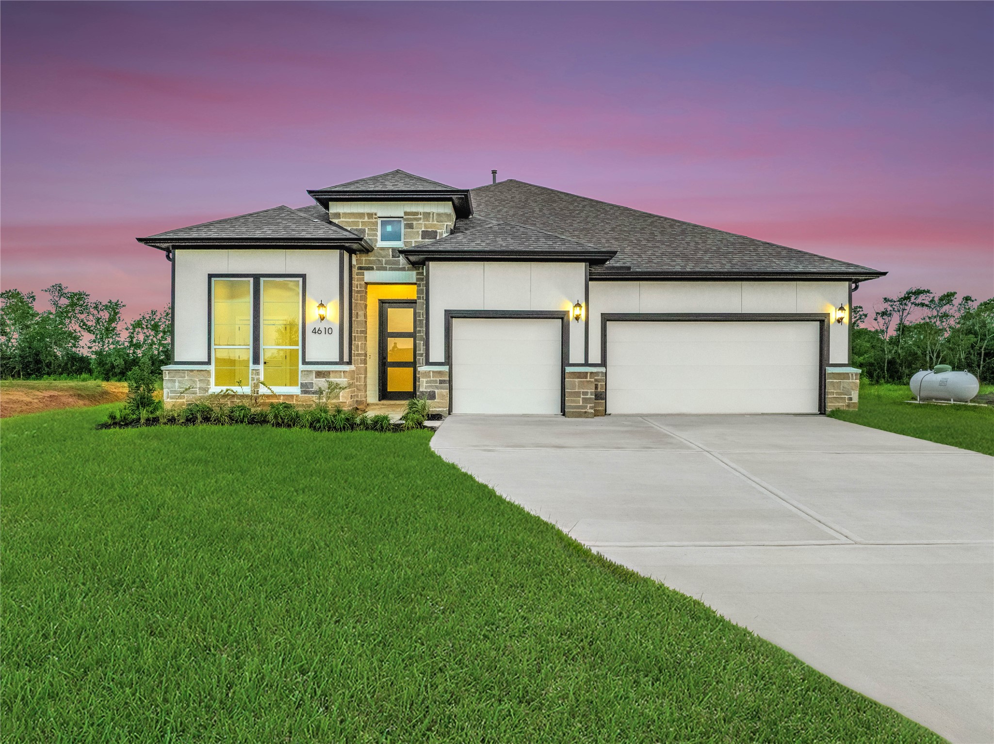 4610 Magnolia Bend Drive Rosharon, TX 77583 - Photo 1 of 48 a front view of a house with a yard and garage