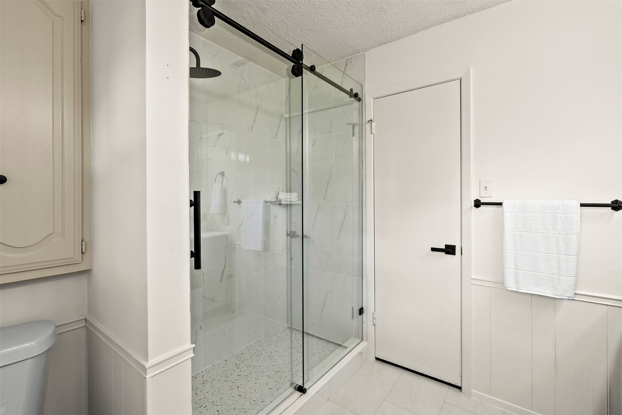 303 West Sequoia Spur Georgetown, TX 78628 - Photo 18 of 34 a bathroom with a shower and a toilet