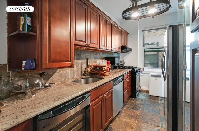 a utility room with dryer washer and dryer