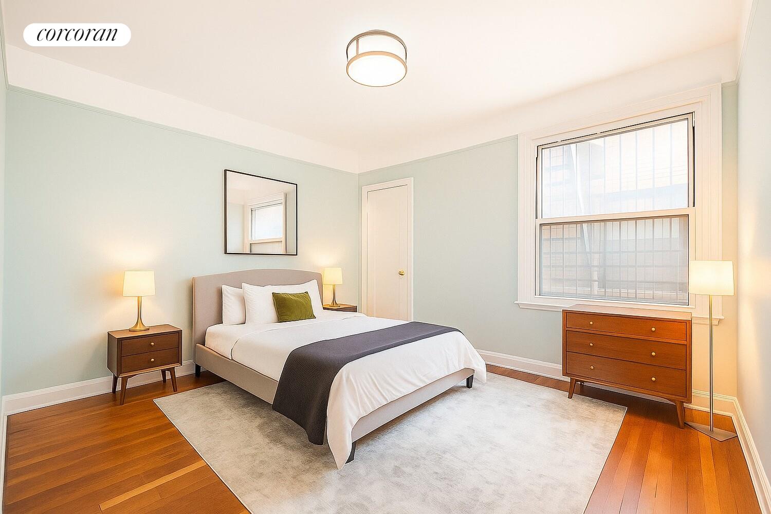 875 West 181st Street, Unit 4L Manhattan, NY 10033 - Photo 4 of 18 a bedroom with a bed and a window