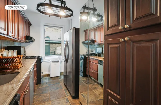 a bathroom with a sink a shower and a mirror