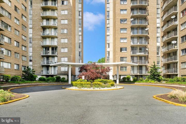 1836 Metzerott Road, Unit 1524 Hyattsville, MD 20783 - Photo 2 of 22 a view of a street with a building in front of it