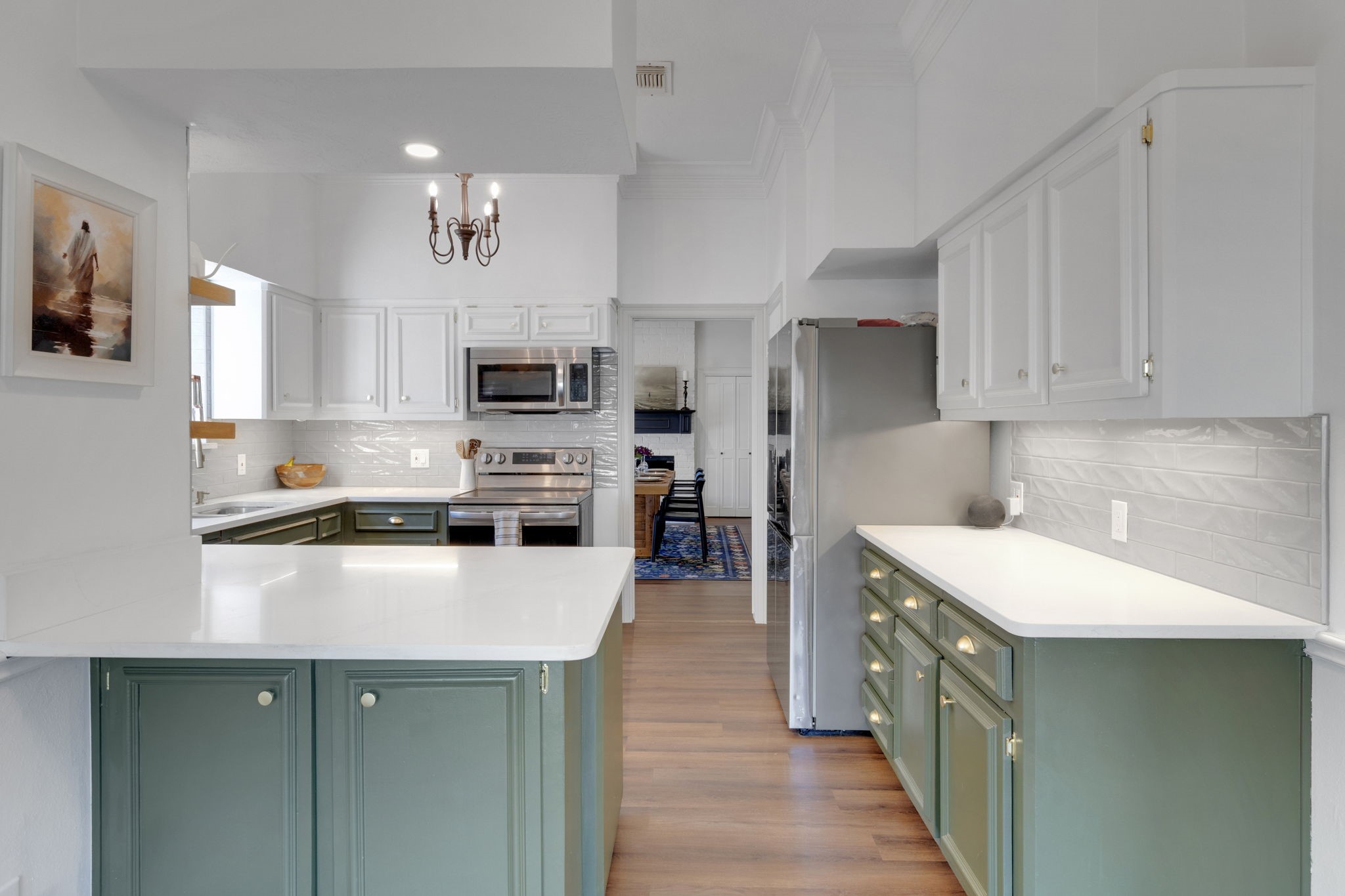 3627 Rolling Forest Drive Spring, TX 77388 - Photo 10 of 47 Gorgeous quartz countertops are showcased here along with updated cabinets and hardware giving this kitchen a modern and fashionable vibe.