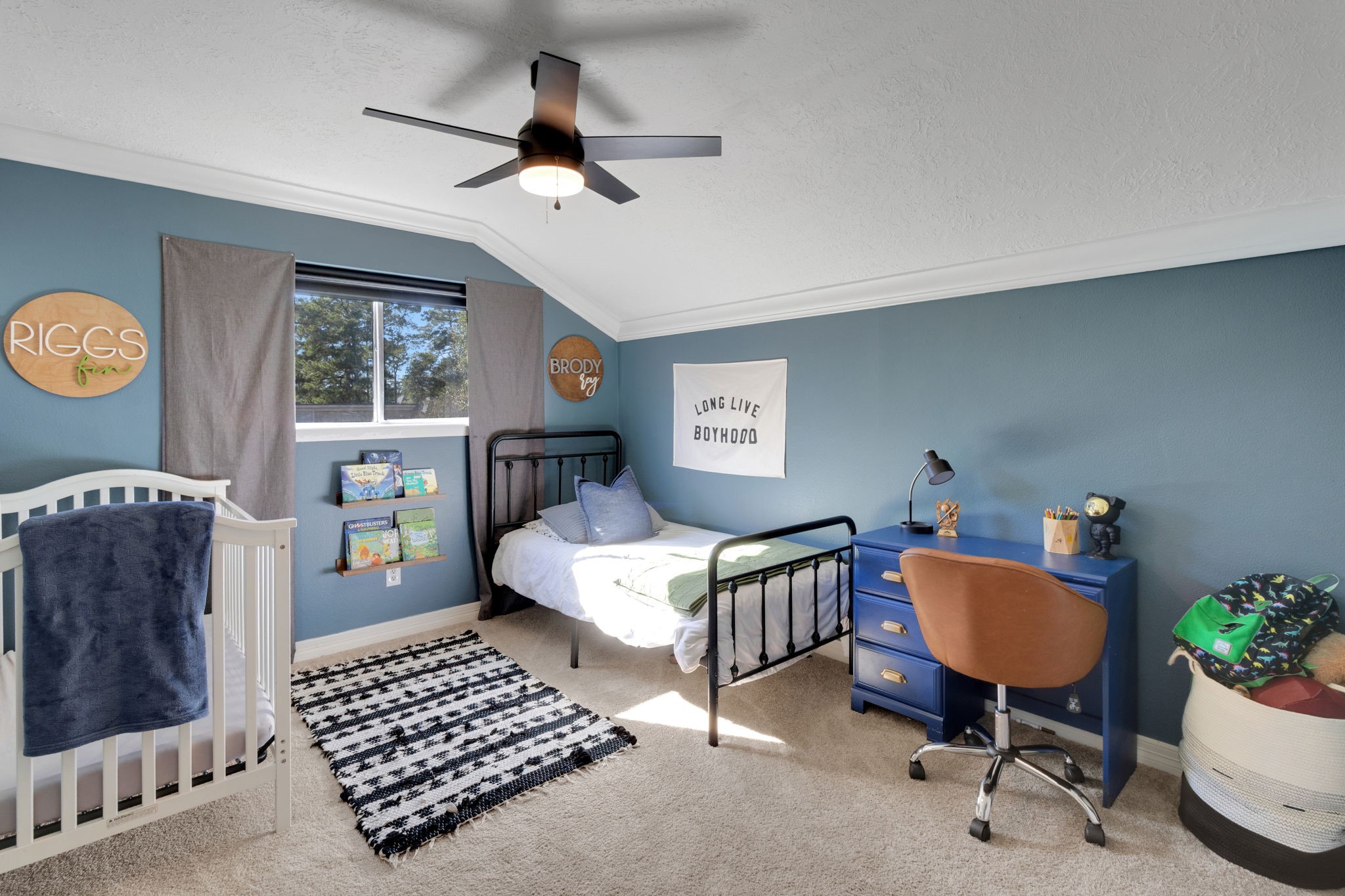 3627 Rolling Forest Drive Spring, TX 77388 - Photo 32 of 47 Third bedroom upstairs is a cozy space with crown molding, wall accents and updated fixture.