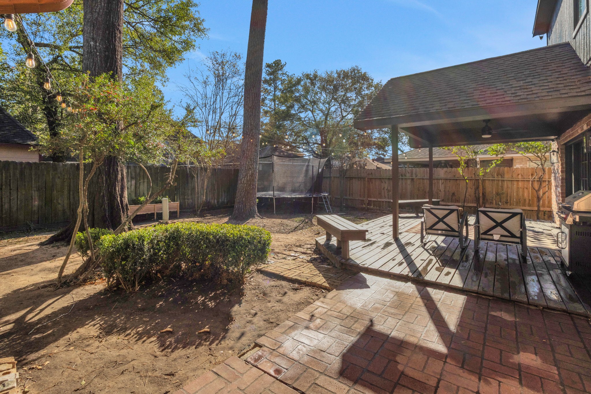 3627 Rolling Forest Drive Spring, TX 77388 - Photo 41 of 47 Pavers from patio lead to backdoor entrance to utility room, and also to detached garage.