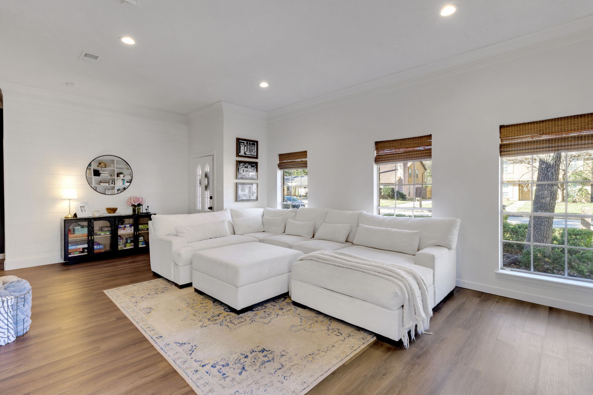 3627 Rolling Forest Drive Spring, TX 77388 - Photo 6 of 47 Spacious living area boasts large windows for gentle natural light.