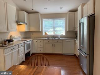 9 New Freedom Road Medford, NJ 08055 - Photo 3 of 9 a kitchen with a sink a window and stainless steel appliances
